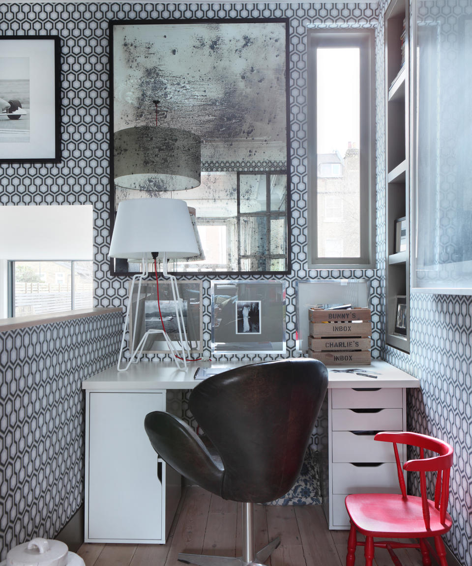 <p> Carve a small home office that's impactful too out of an awkward semi-open-plan space. To link the two spaces, the decorative and eye-catching Hicks Hexagon wallpaper by Cole & Son has been used with practical furnishings, such as the classic Swan chair by Arne Jacobsen. </p>