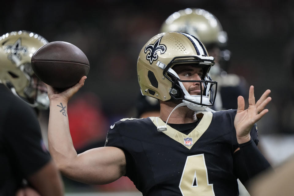 New Orleans Saints quarterback Derek Carr (4) warms up before a preseason NFL football game against the Kansas City Chiefs in New Orleans, Sunday, Aug. 13, 2023. (AP Photo/Gerald Herbert)