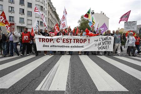 Private and public sector workers demonstrate over pension reforms in Lyon, September 10, 2013. REUTERS/Emmanuel Foudrot