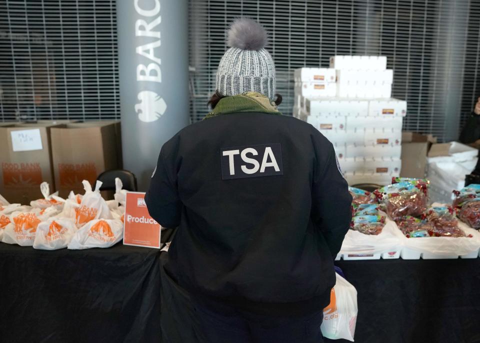 A furloughed Transportation Security Administration employee at a food bank in Brooklyn, New York, on Jan. 22, 2019.