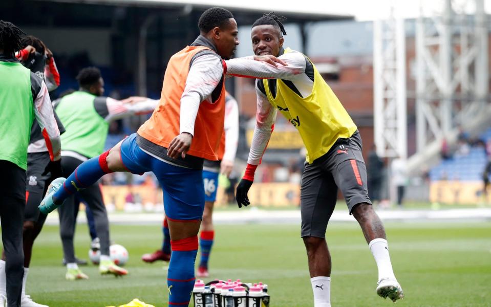 Wilfried Zaha during the warm up before the match - REUTERS