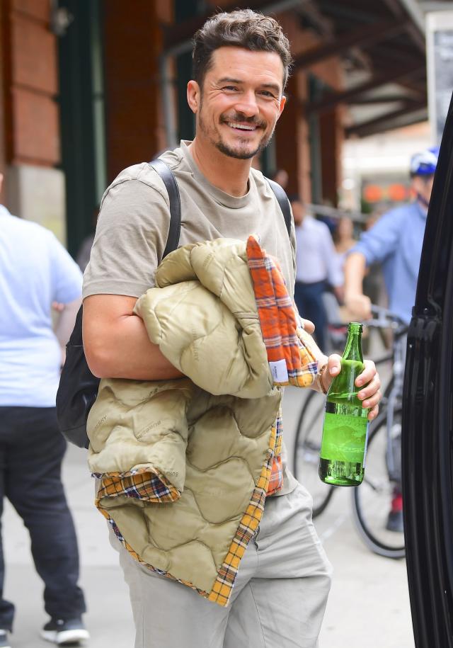 Hailey Baldwin in logo print tee and green pants at John Mayer concert ~ I  want her style - What celebrities wore and where to buy it. Celebrity Style