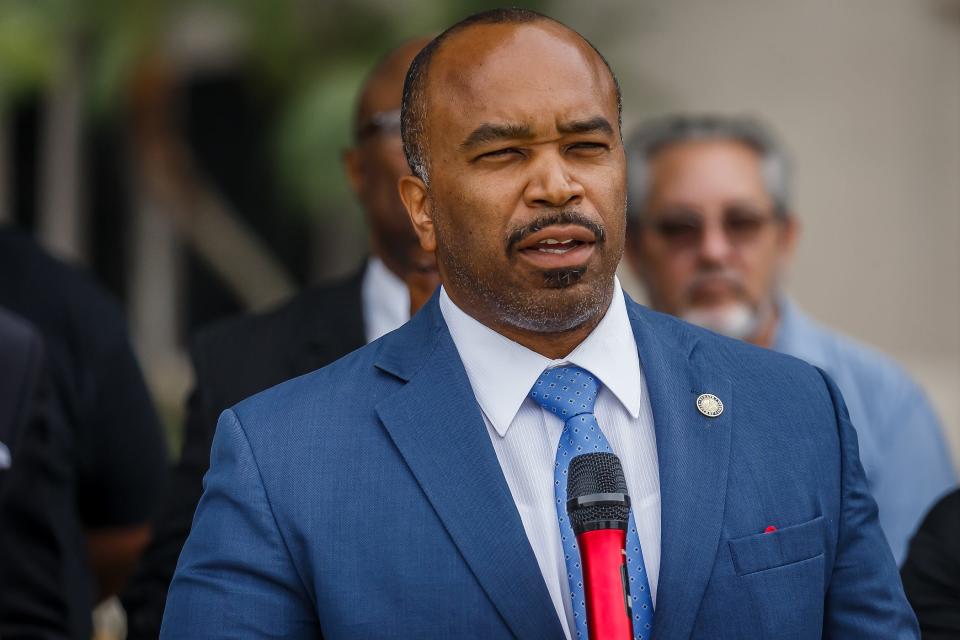 State Sen. Bobby Powell on July 25 speaks in opposition to recent education standards about teaching slavery outside of the Fulton-Holland Educational Services Center.