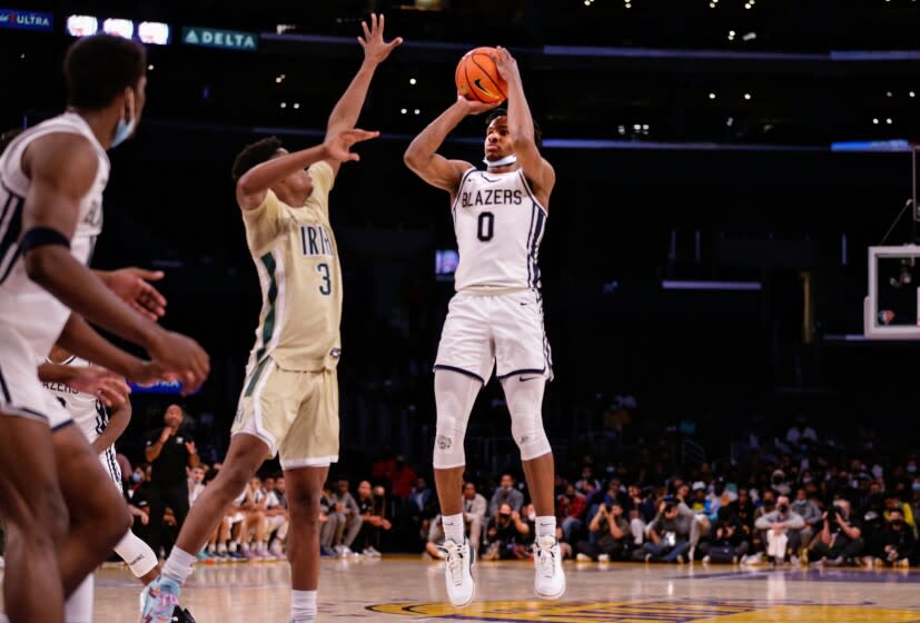 LOS ANGELES, CA - DECEMBER 04: Bronny James (0) point guard for Sierra Canyon attempts a jumper.