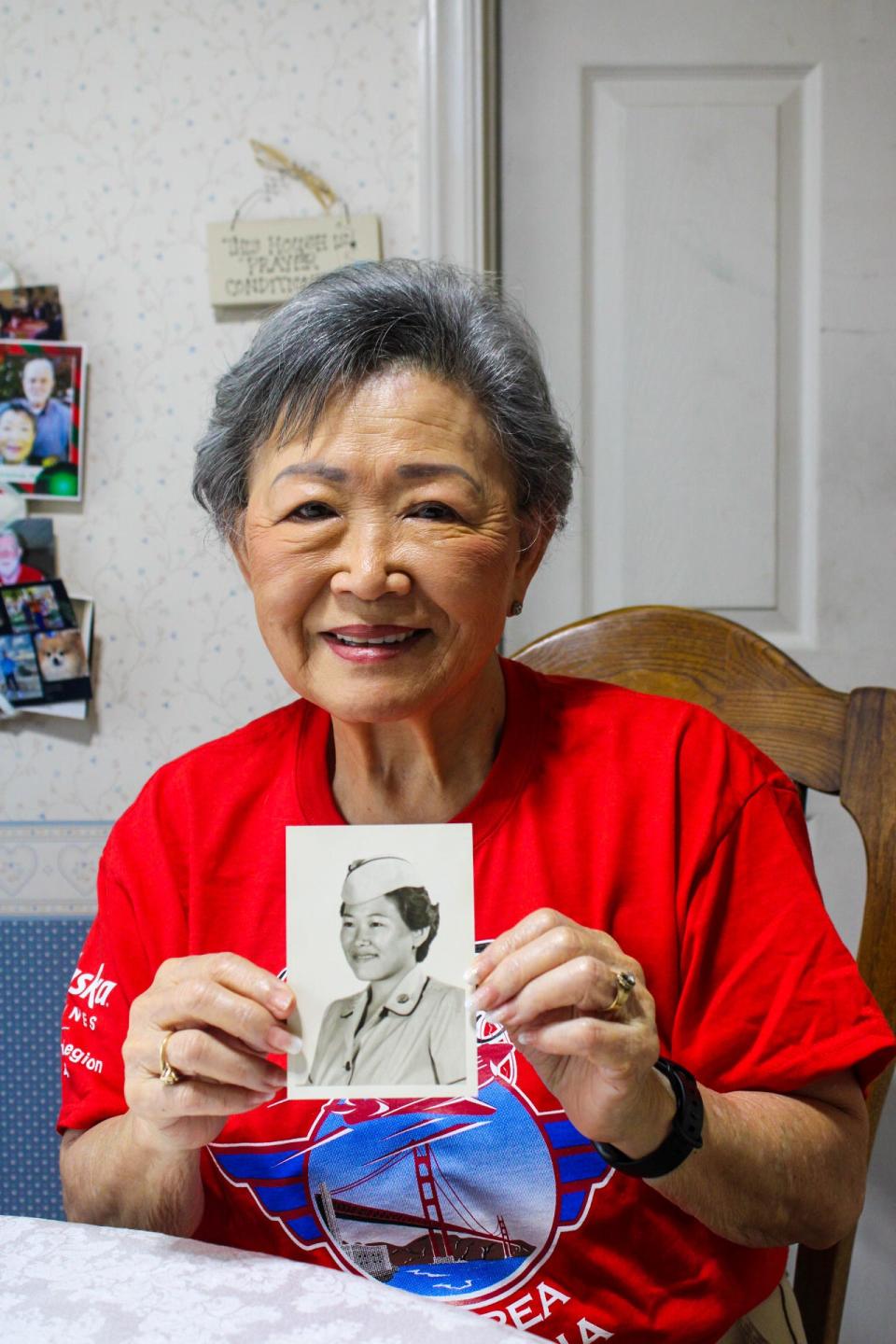 Inside of her Stockton home, veteran Pollyanne Nakamura Johnston shares a photograph from her days in the Army on Thursday, Sept. 7, 2023. PollyAnne was the first Japanese-American woman from Stockton to enlist in the Army.