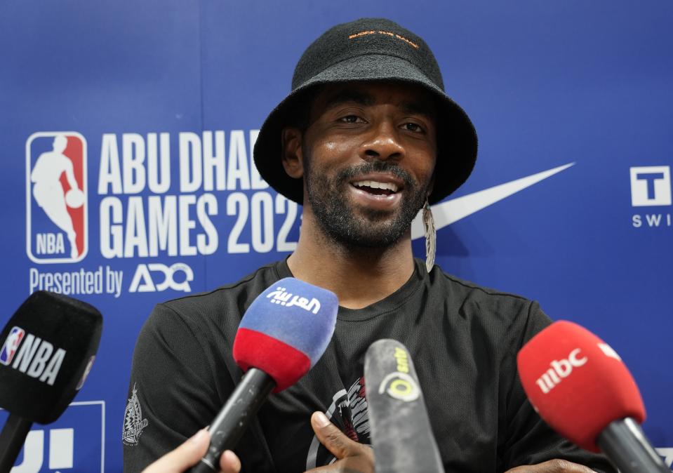 Dallas Mavericks Kyrie Irving talks to journalists during a practice session in Abu Dhabi, United Arab Emirates, Wednesday Oct. 4, 2023. Dallas Mavericks will play against Minnesota Timberwolves on Oct. 5 and Oct. 7 in Abu Dhabi. (AP Photo/Kamran Jebreili)