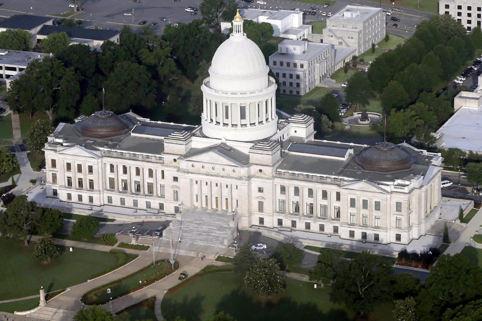 FILE - The Arkansas state Capitol building is seen on May 29, 2015, in Little Rock, Ark. Voters in three Arkansas state House districts will return to the polls Tuesday, April 2, 2024, to complete some unfinished business from the March 5 primaries. The top two finishers from primaries where no candidate received a majority will compete in runoff elections for a spot on the November ballot. (AP Photo/Danny Johnston, File)