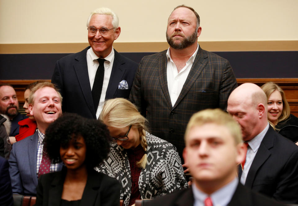 <span class="s1">Political operative Roger Stone and Alex Jones of Infowars, standing, arrive before Google CEO Sundar Pichai’s testimony. (Photo: Jim Young/Reuters)</span>