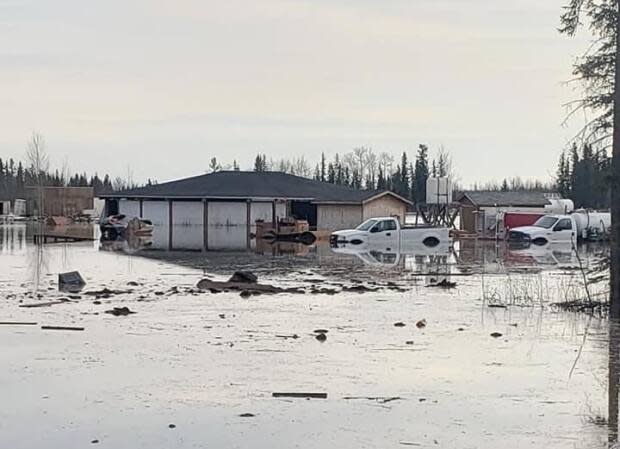 Flooding in Jean Marie River in May 2021. The territory had promised replacement homes for people before the winter, but has now pushed that timeline back to early 2022. (Paul Thunder-Stealer/Facebook - image credit)