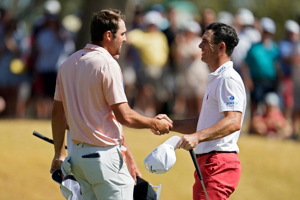 Billy Horschel (right) shakes hands with Scottie Scheffler after dropping losing 1-up in the round of 16 in the Dell Technologies Match Play in Austin, Texas. Horschel beat Scheffler in the championship match in 2021.