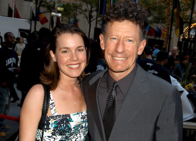 <p>Brian ZAK/Gamma-Rapho/Getty</p> Lyle Lovett and April Kimble at the Rockefeller Center Motorcycle Show.