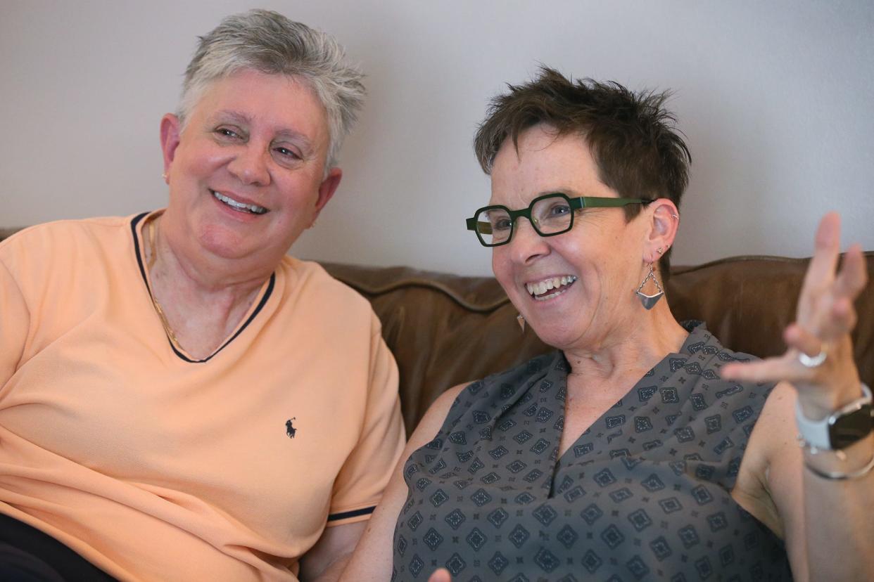 Ellen and Wendy McWilliams-Woods talk about their lives, career and family at their home in Kent on Sunday. Ellen is retiring as assistant superintendent of Akron Public Schools.