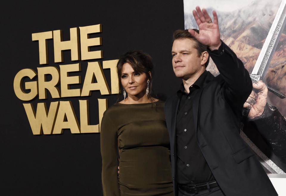 Matt Damon, a cast member in "The Great Wall," poses with his wife Luciana Barroso at the premiere of the film at the TCL Chinese Theatre on Wednesday, Feb. 15, 2017, in Los Angeles. (Photo by Chris Pizzello/Invision/AP)