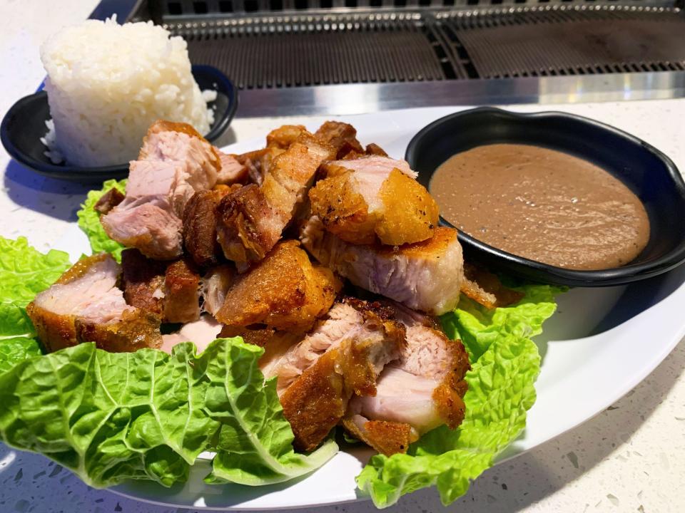 Lechon kawali is crispy fried pork belly.