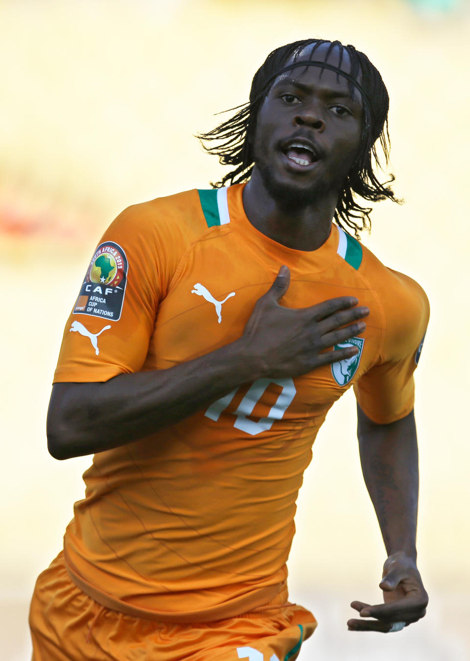 FILE - In this Jan. 26, 2013, file photo, Ivory Coast's Gervinho celebrates after scoring the opening goal against Tunisia during their African Cup of Nations group D match at the Royal Bafokeng stadium in Rustenburg, South Africa. The two other teams in group D are Togo and Algeria. (AP Photo/Armando Franca, File)