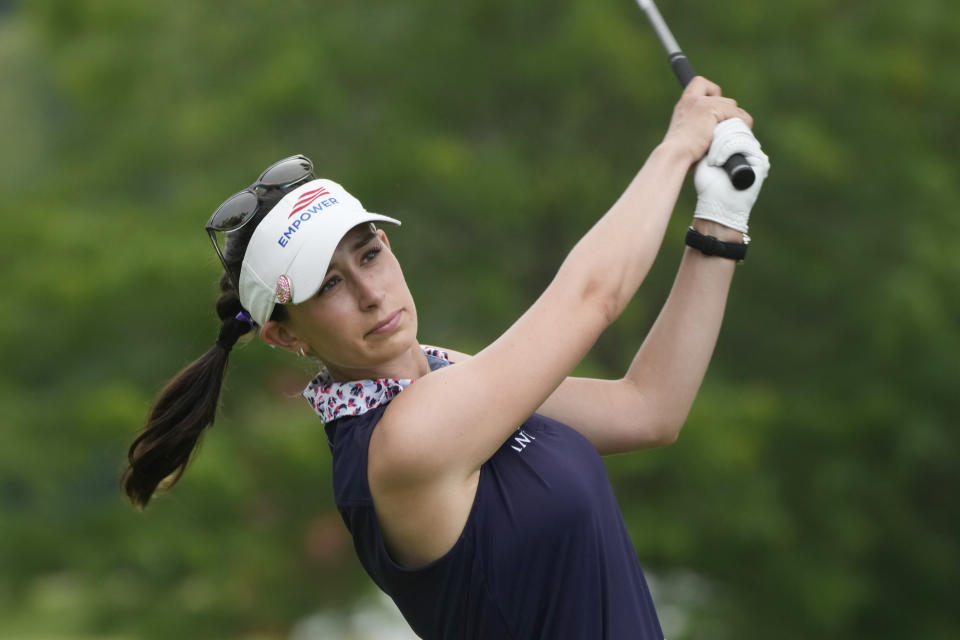 Cheyenne Knight drives off the 13th tee during the final round of the Dow Great Lakes Bay Invitational golf tournament at Midland Country Club, Saturday, July 22, 2023, in Midland, Mich. (AP Photo/Carlos Osorio)