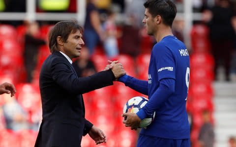 Chelsea manager Antonio Conte shakes hands with Chelsea's Alvaro Morata - Credit: Reuters