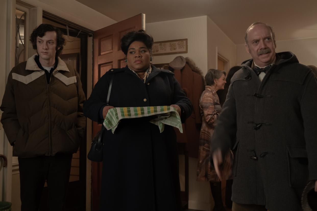 Dominic Sessa (from left), Da'Vine Joy Randolph and Paul Giamatti form an unlikely family of sorts in "The Holdovers."