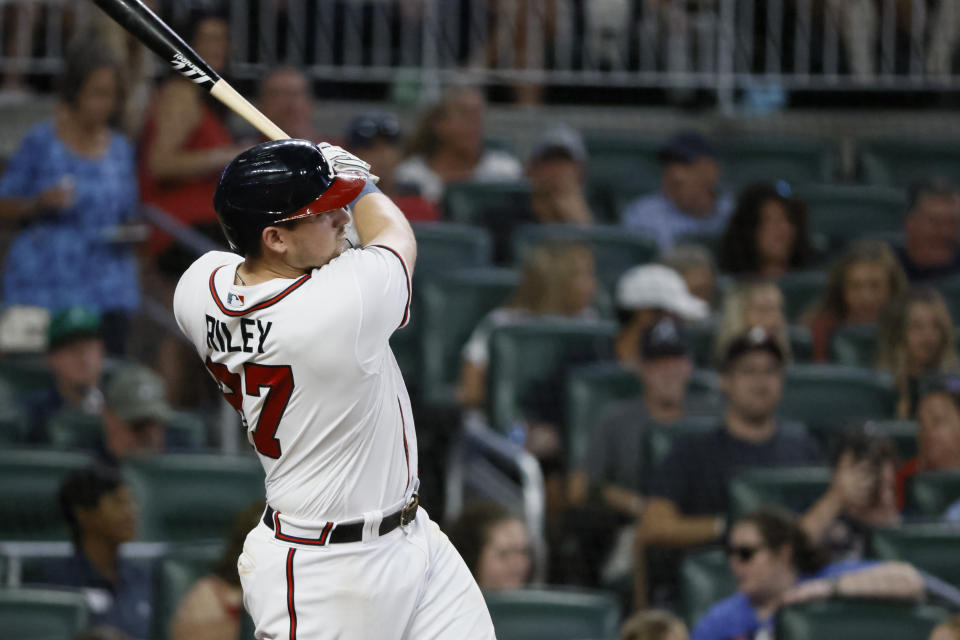 Atlanta Braves' Austin Riley hits a solo home run in the fourth inning of a baseball game against the Miami Marlins on Saturday, Sept. 3, 2022, in Atlanta. (AP Photo/Bob Andres)