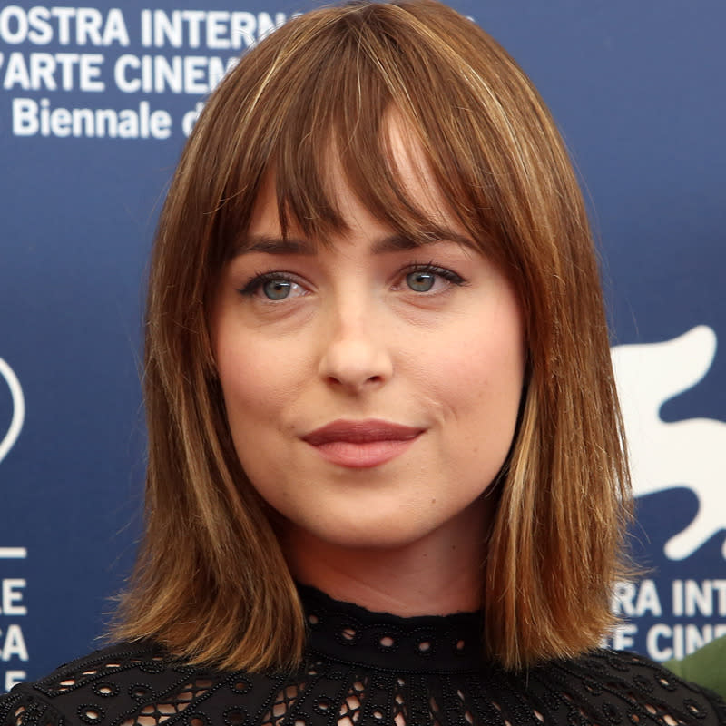 At a photocall for her film “Black Mass,” Johnson keeps her ‘do simple, with her bangs falling naturally against her forehead. Perfect bangs for day. 