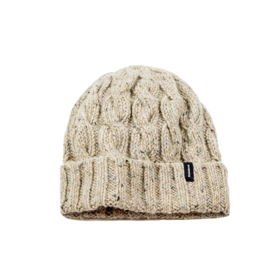 <p><span>Channel your inner angler in this classic cable knit fisherman beanie, the <a rel="nofollow noopener" href="http://www.finisterre.com/shop/mens/accessories/hats-and-beanies/carnkie-shale.html" target="_blank" data-ylk="slk:Carnkie Beanie;elm:context_link;itc:0;sec:content-canvas" class="link ">Carnkie Beanie </a></span><b>(£30)</b><span>, from British company Finisterre. It is made from 100% wool flecked tweed yarn, which is soft, warm and naturally breathable, ideal for keeping you cosy both on and off the mountain. [Photo: Finisterre] </span> </p>