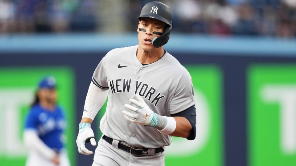 May 15, 2023; Toronto, Ontario, CAN; New York Yankees right fielder Aaron Judge (99) runs the bases after hitting a home run against the Toronto Blue Jays during the first inning at Rogers Centre.