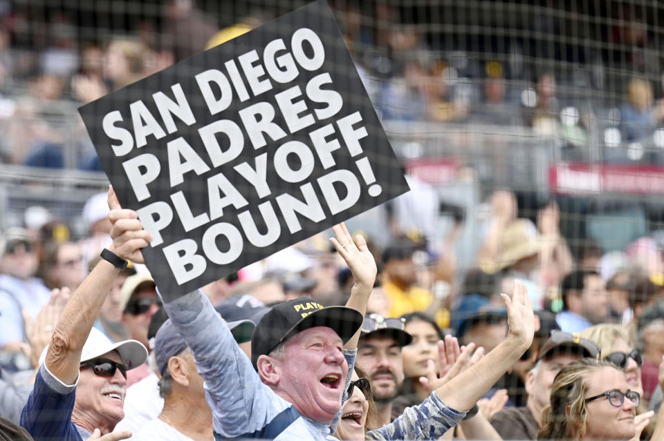SAN DIEGO, CA - OCTOBER 5:  A San Diego Padres fan holds up a sign a during the second inning of a baseball game against the San Francisco Giants on October 5, 2022 at Petco Park in San Diego, California. (Photo by Denis Poroy/Getty Images)