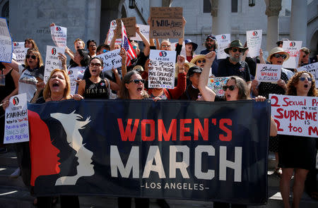 Demonstrators gather outside Los Angeles City Hall to protest the Senate Judiciary committee's vote on President Trump's U.S. Supreme Court pick Brett Kavanaugh, in Los Angeles, California, U.S., September 28, 2018. REUTERS/Mike Blake