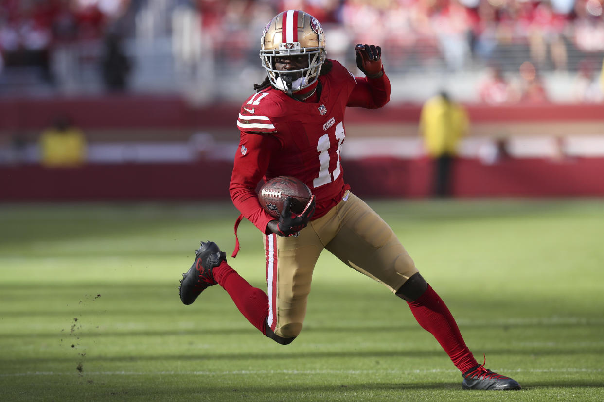 San Francisco 49ers wide receiver Brandon Aiyuk (11) runs during an NFL football game against the Tampa Bay Buccaneers, Sunday, Nov. 19, 2023, in Santa Clara, Calif. (AP Photo/Scot Tucker)