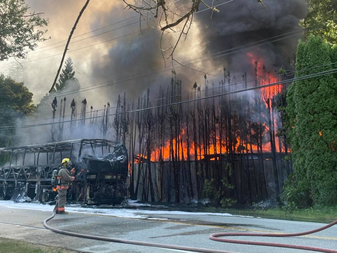 Chilliwack fire officials are investigating a fire that broke out on a tour bus on Vedder Mountain Road carrying school-aged children. (Submitted by Angela Bergen - image credit)