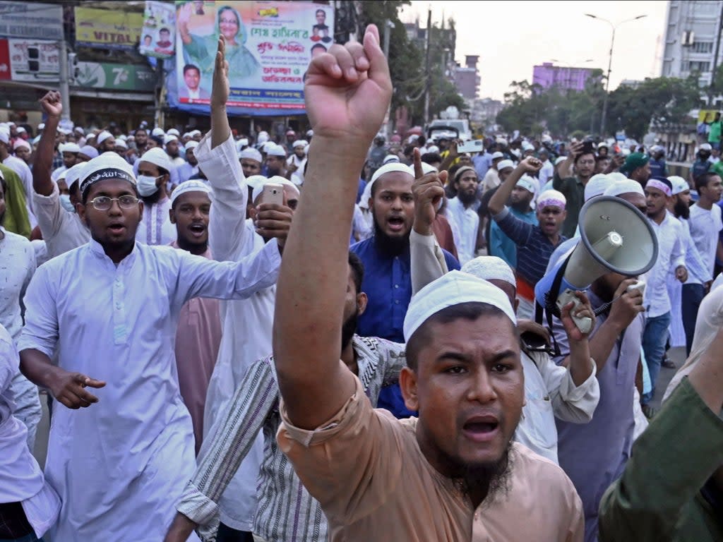 Activists of Islami Andolan Bangladesh take part in a protest outside the National Mosque in Dhaka (Munir Uz Zaman/AFP via Getty Images)