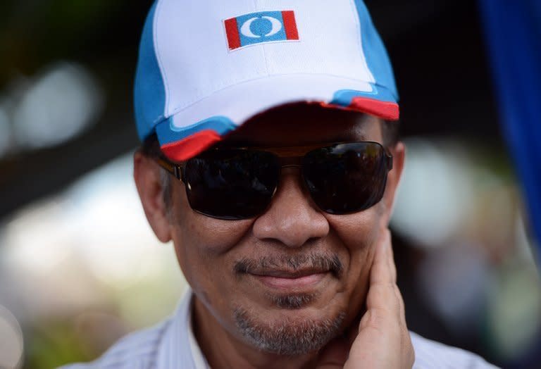 Malaysian opposition leader Anwar Ibrahim during an election rally on April 29, 2013. Anwar promises to free state-controlled traditional media and break cosy ties between politics and business