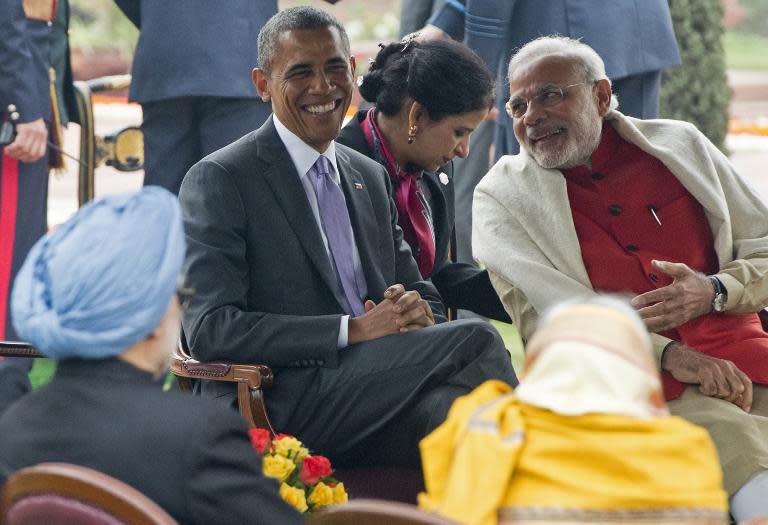 US President Barack Obama smiles as he sits alongside Indian Prime Minister Narendra Modi during a reception at Rashtrapati Bhawan in New Delhi, on January 26, 2015