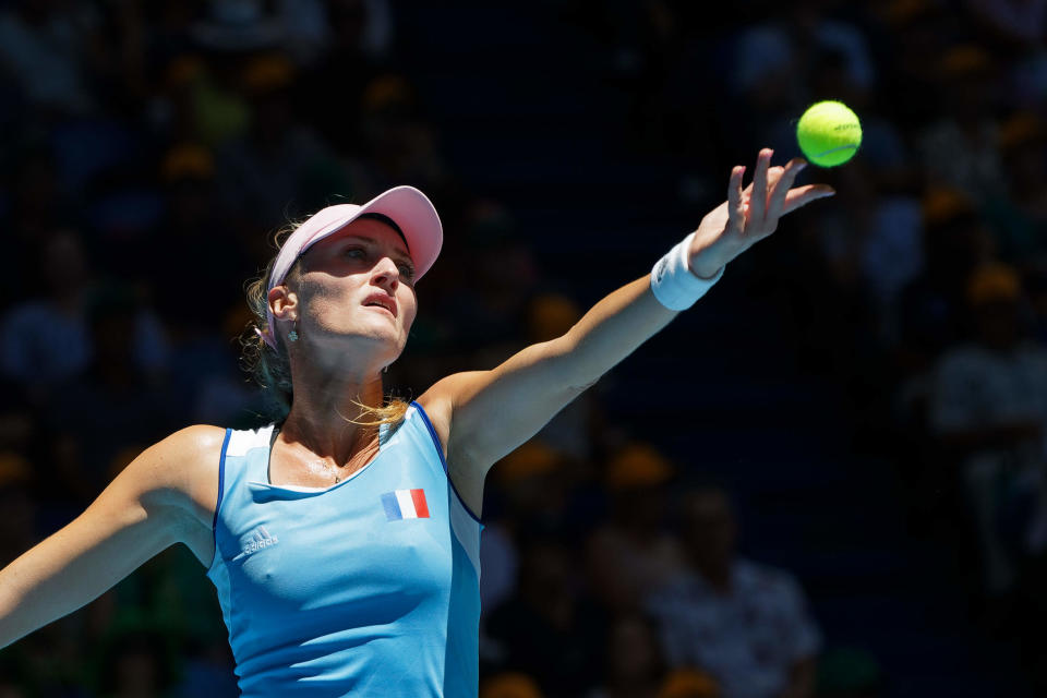 France's Kristina Mladenovic prepares to serve during her match against Australia's Ajla Tomljanovic during their Fed Cup tennis final in Perth, Australia, Saturday, Nov. 9, 2019. (AP Photo/Trevor Collens)