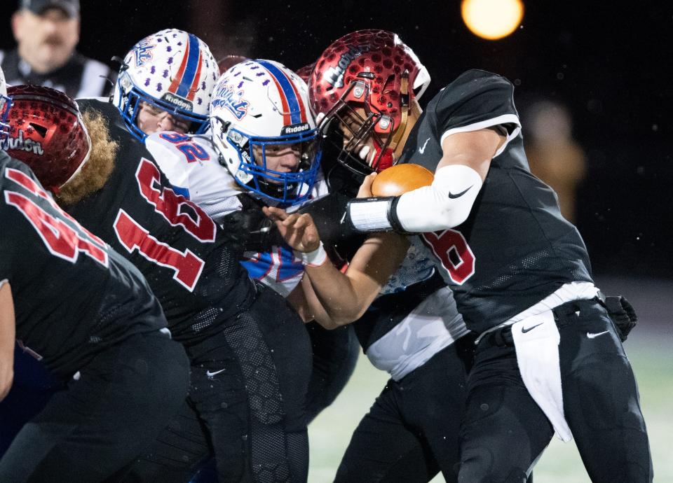 West Holmes defender Blake McCombs collides with a Chardon's Alex Henry.