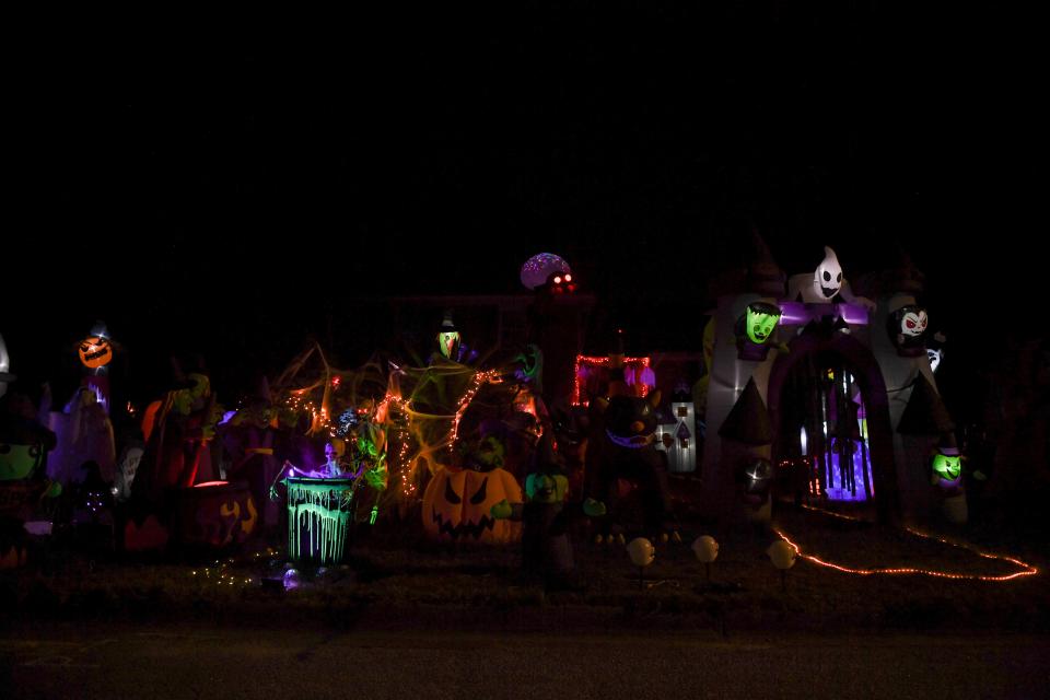 Inflatables sit outside the Imler house on Indian Creek Road on Tuesday, Oct. 17, 2023.