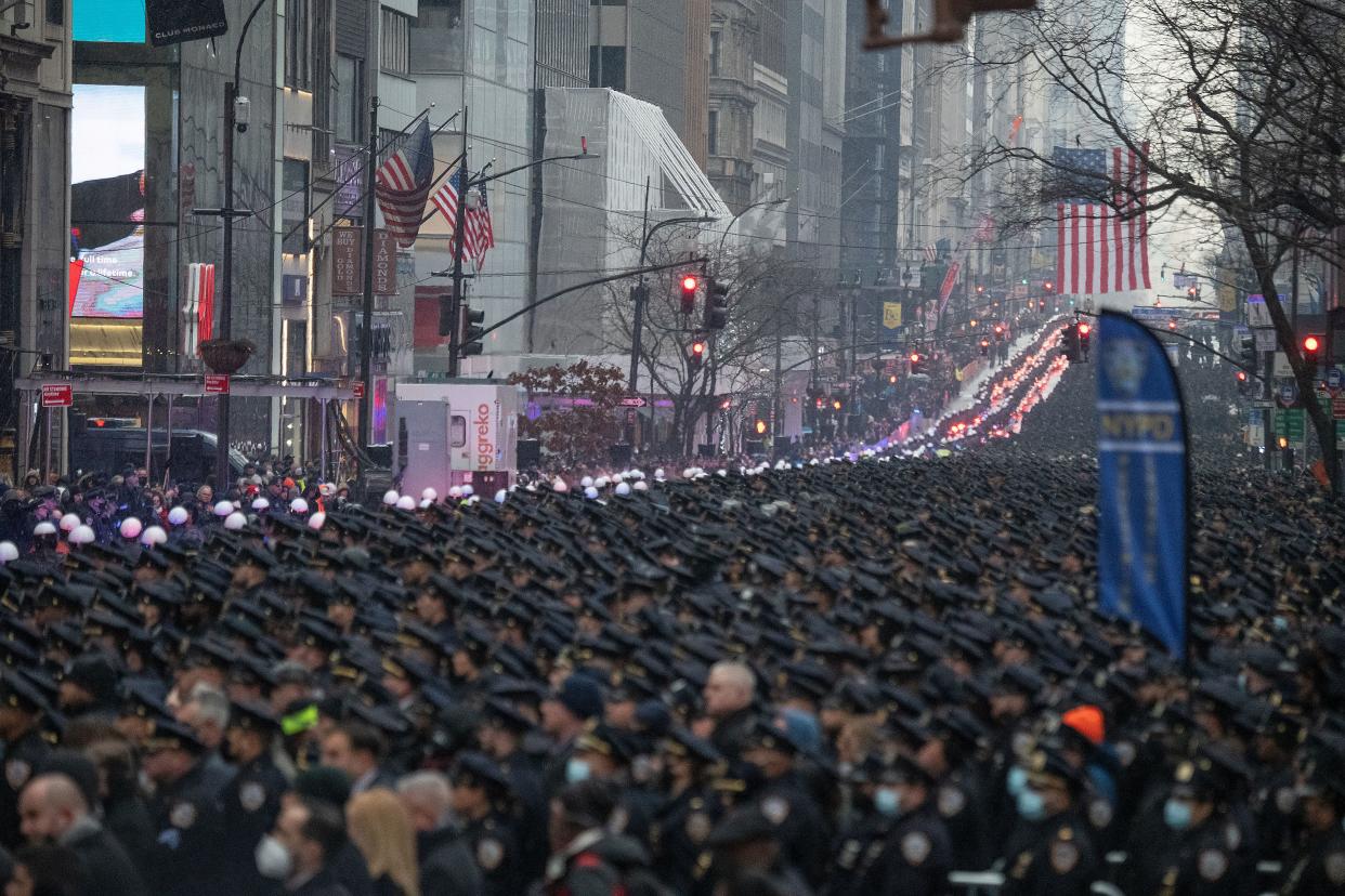 NYPD Officer Jason Rivera's funeral procession makes its way south on Fifth Avenue following the fallen officer's funeral at St. Patrick's Cathedral in Manhattan, New York on Friday, Jan. 28, 2022.