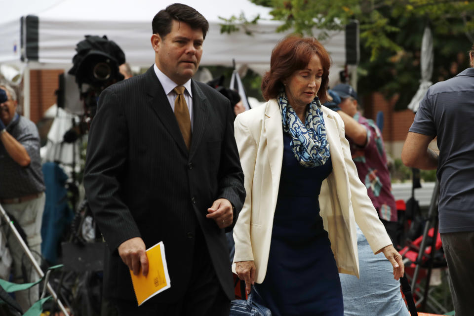 <p>Paul Manafort’s wife Kathleen Manafort, right, walks with Manafort spokesman Jason Maloni, to federal court for jury deliberations in the trial of the former Trump campaign chairman, in Alexandria, Va., Tuesday, Aug. 21, 2018. (Photo: Jacquelyn Martin/AP) </p>