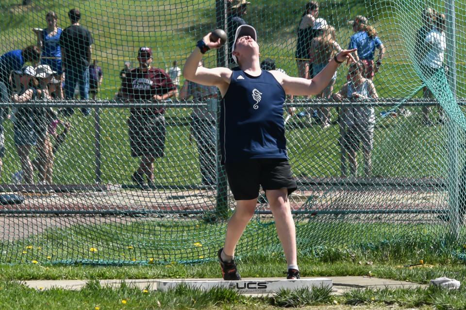 Burlington's Winslow Sightler competes in the preliminary rounds of shot put at the 2022 Burlington Invitational Track and Field Meet.