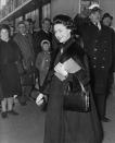 <p>Princess Margaret uses a loose overcoat to accommodate her growing bump.</p>