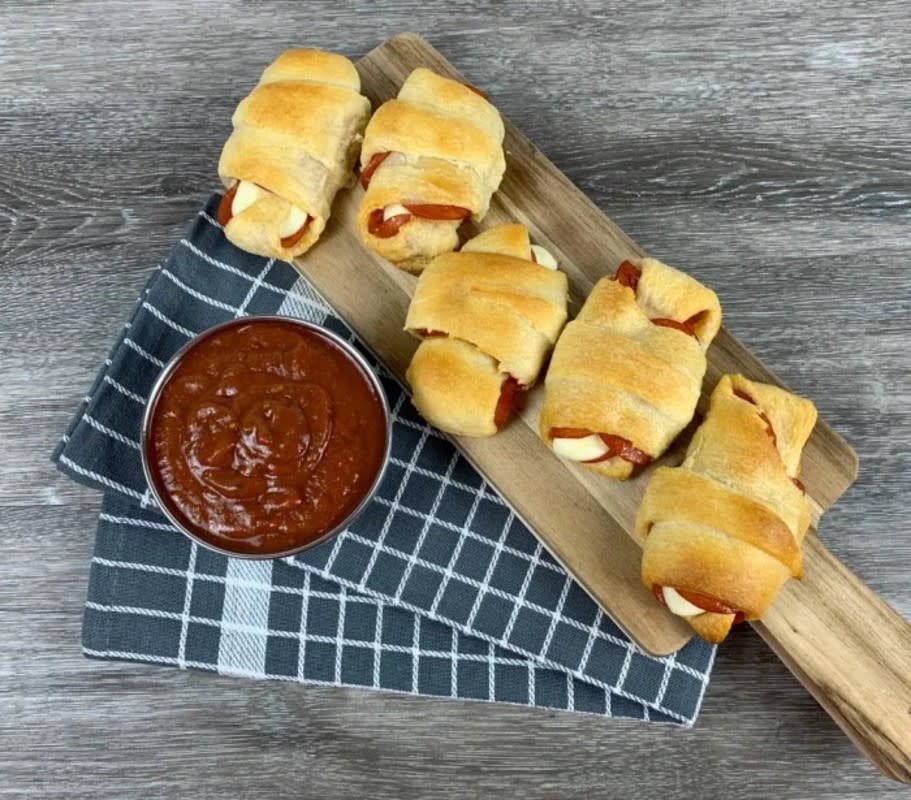 <p>Pam Beth</p><p>This quick app only has four ingredients and is perfect for a party, game day or after-school snack.</p><p><strong>Get the recipe: <a href="https://parade.com/987299/pambeth/easy-4-ingredient-pizza-roll-bites-recipe/" rel="nofollow noopener" target="_blank" data-ylk="slk:Pizza Roll Bites;elm:context_link;itc:0;sec:content-canvas" class="link ">Pizza Roll Bites</a></strong></p>