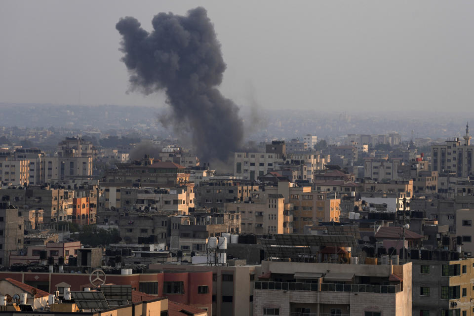 Smoke rises after Israeli airstrikes on residential building in Gaza, Saturday, Aug. 6, 2022. (AP Photo/Adel Hana)