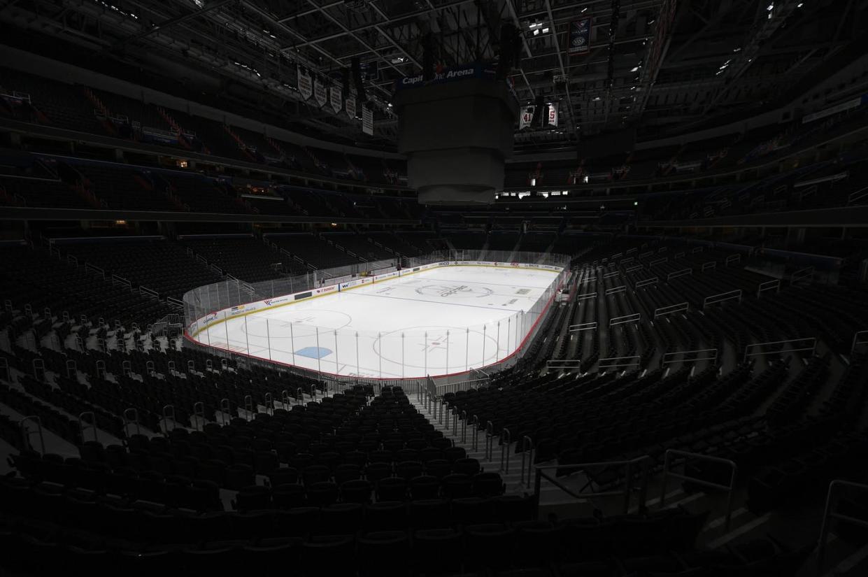 <span class="caption">The Capital One Arena, home of the Washington Capitals, sits empty. </span> <span class="attribution"><a class="link " href="http://www.apimages.com/metadata/Index/Virus-Outbreak-Sports-Photo-Gallery/d5850f20cdc44fb2adc5be6b22d64df7/1/0" rel="nofollow noopener" target="_blank" data-ylk="slk:AP Photo/Nick Wass;elm:context_link;itc:0;sec:content-canvas">AP Photo/Nick Wass</a></span>