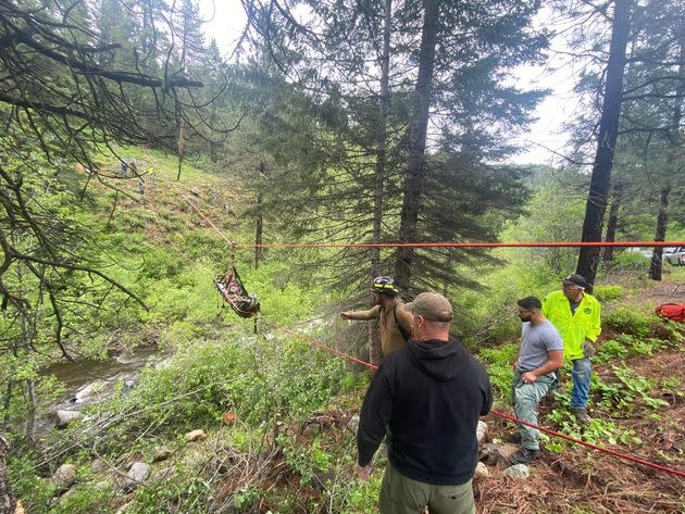 A photo shows the rescue operation for Garrett in Oregon.