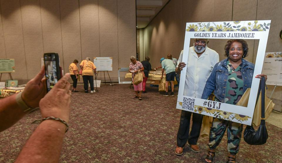 Rufus and Jean Clinkscales pose entering the 9th Annual Golden Years Jamboree at the Anderson Sports & Entertainment Complex in Anderson, SC, Wednesday, July 17, 2024.