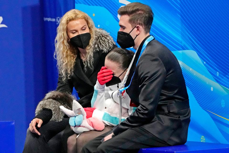 Kamila Valieva and her coaches react to a disappointing skate in the women’s figure skating free program at the Beijing Olympics.