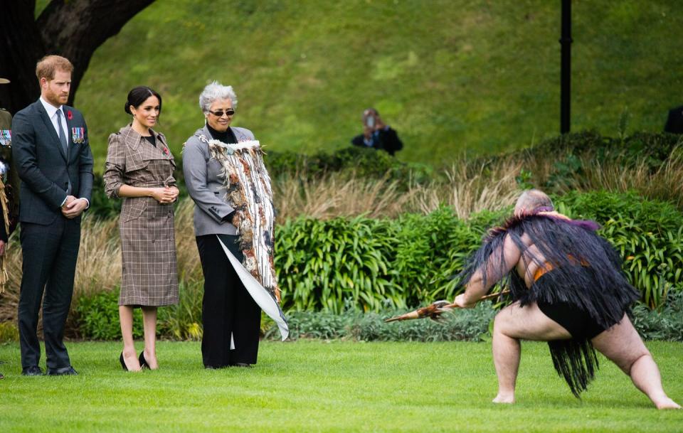 Harry and Meghan taking in the ceremony.