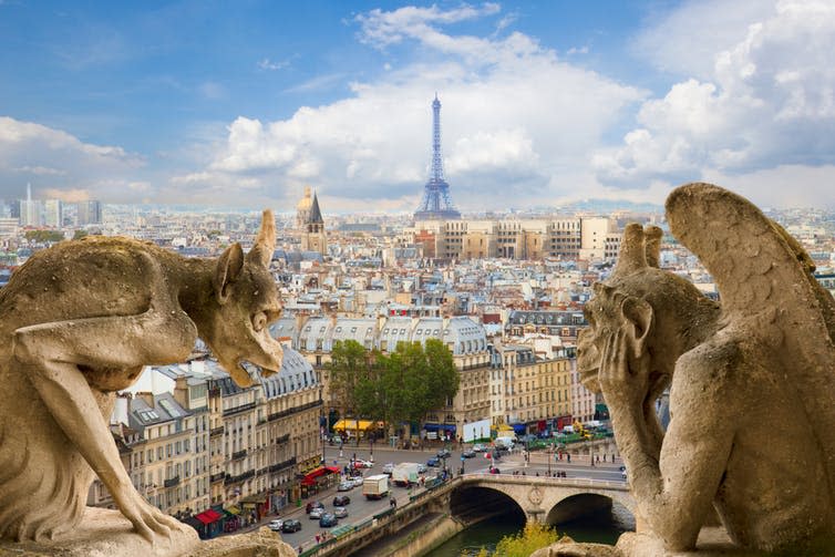 <span class="caption">Two of Notre Dame’s oldest inhabitants enjoying the view of the Eiffel Tower.</span> <span class="attribution"><span class="source">Neirfy via Shutterstock</span></span>