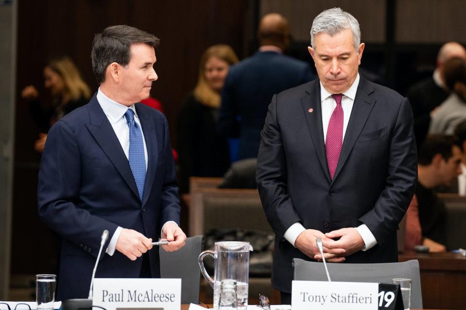 Tony Staffieri, president and chief executive officer of Rogers Communications Inc., right, and Paul McAleese, president of Shaw Communications Inc., arrive at the Standing Committee on Industry and Technology investigating the proposed acquisition of Shaw by Rogers in Ottawa in January 2023. THE CANADIAN PRESS/Spencer Colby