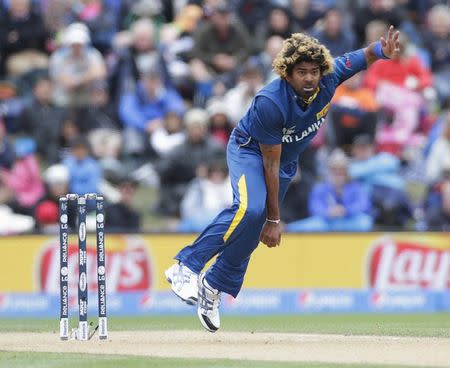 Sri Lankan bowler Lasith Malinga delivers to New Zealand captain Brendon McCullum (not pictured) during their Cricket World Cup match in Christchurch, February 14, 2015. REUTERS/Anthony Phelps